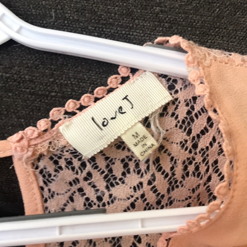 Apricot blouse with lots of detail